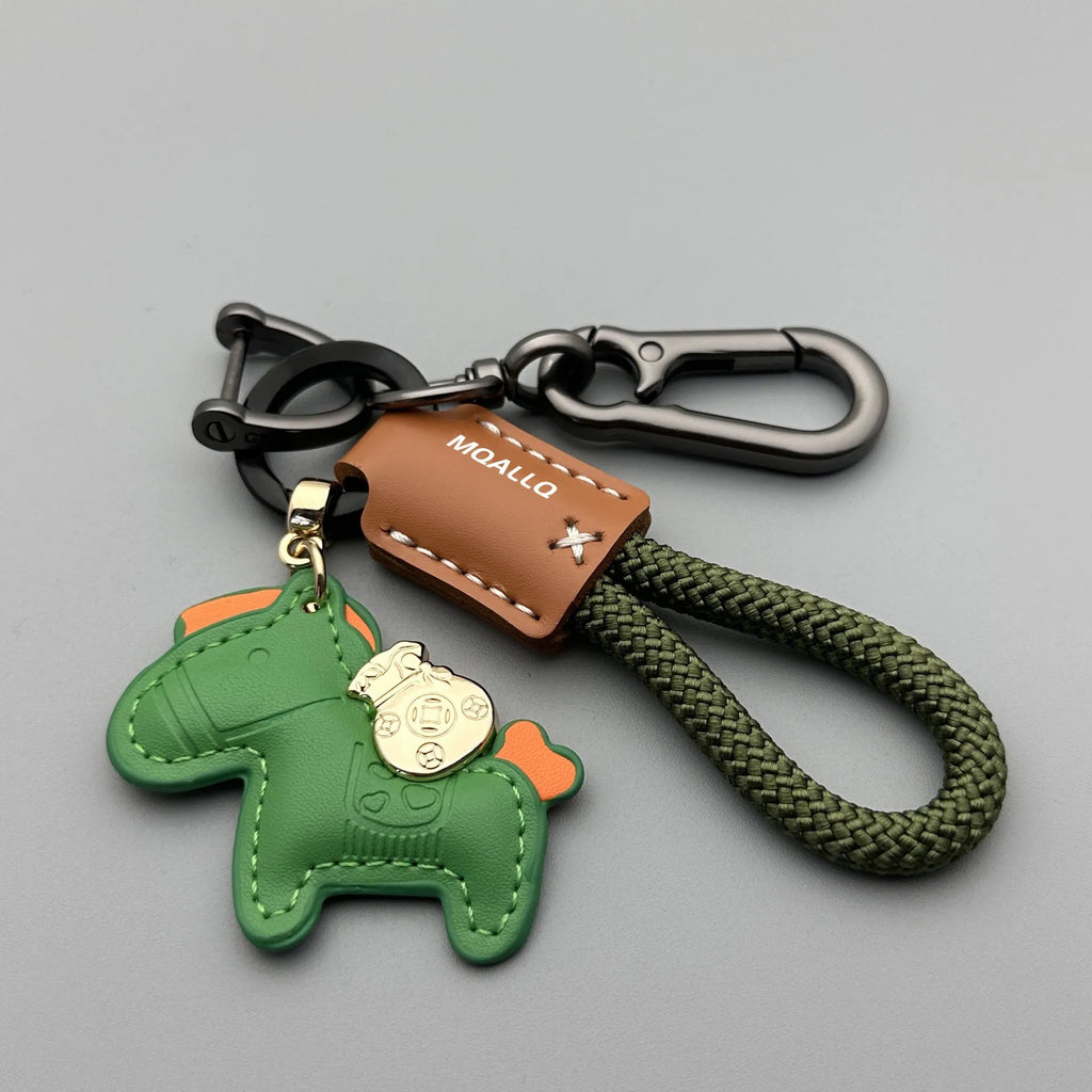Handmade brown cowhide leather car key ring pendant with a zinc alloy belt buckle and green flanelle rope.