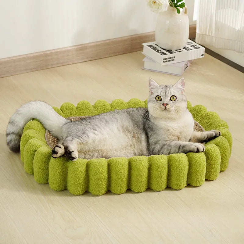 Green oval cat scratch pad and lounge bed made from sisal material