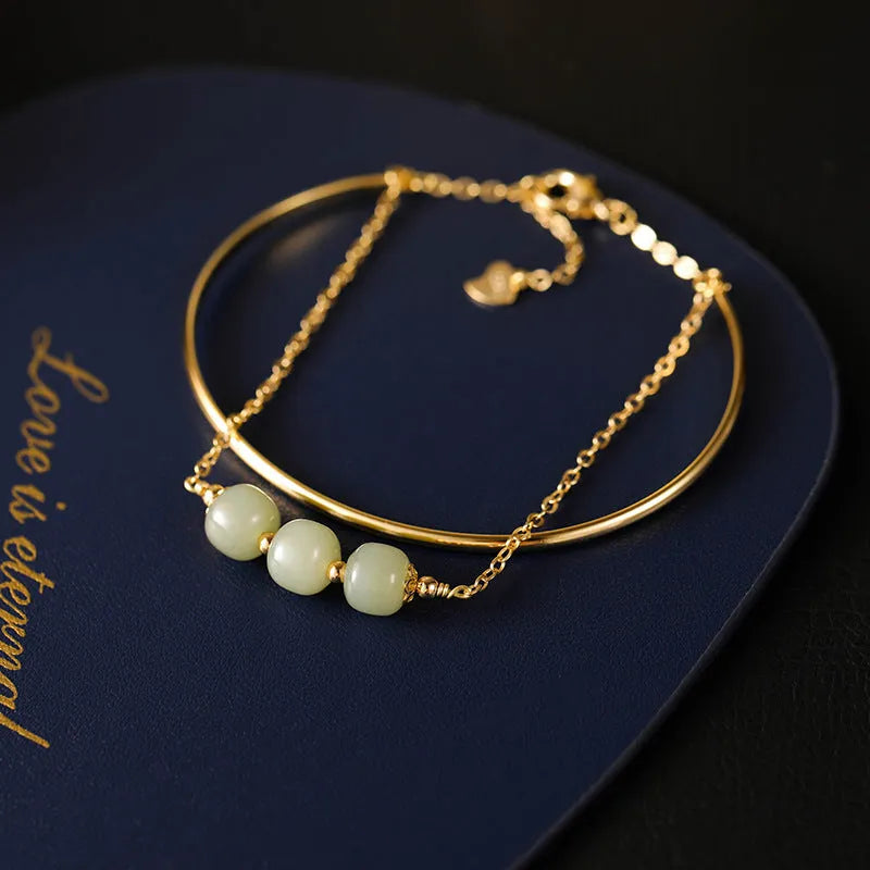 Jade lucky bead bracelet for women with gold inlay treatment in single, double and three beads versions