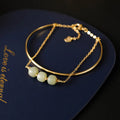 Jade lucky bead bracelet for women with gold inlay treatment in single, double and three beads versions