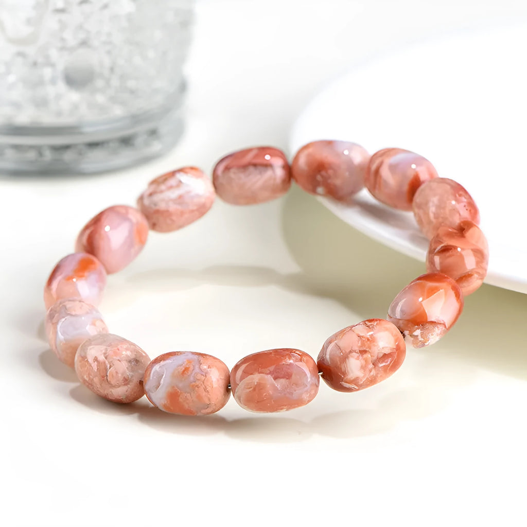 Natural cherry agate barrel bead bracelet with geometric 10x14mm beads and Ruyi charm