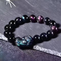 Natural ice colour eye obsidian crystal bracelet showing bead detail and available size options