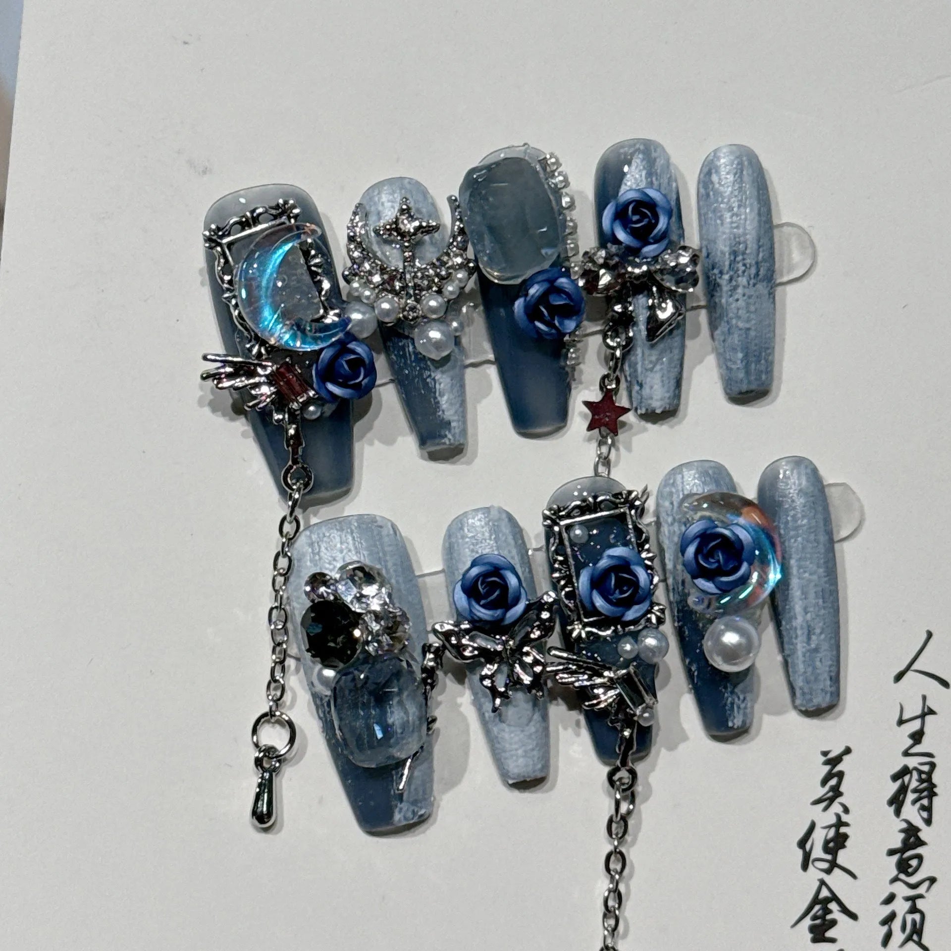 Heavy industry blue night nail stencils with ornate rose, tulip and flower patterns in plastic armour suit