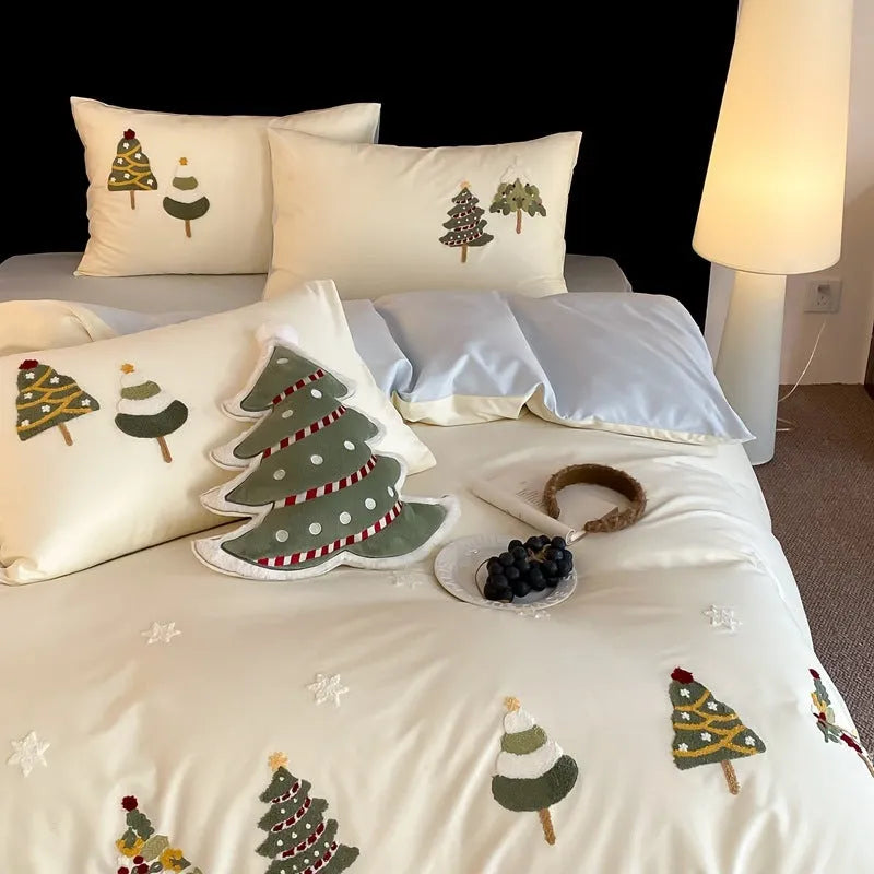 Pure cotton duvet cover set with embroidered Christmas trees and flowers, shown in cream blue colour.