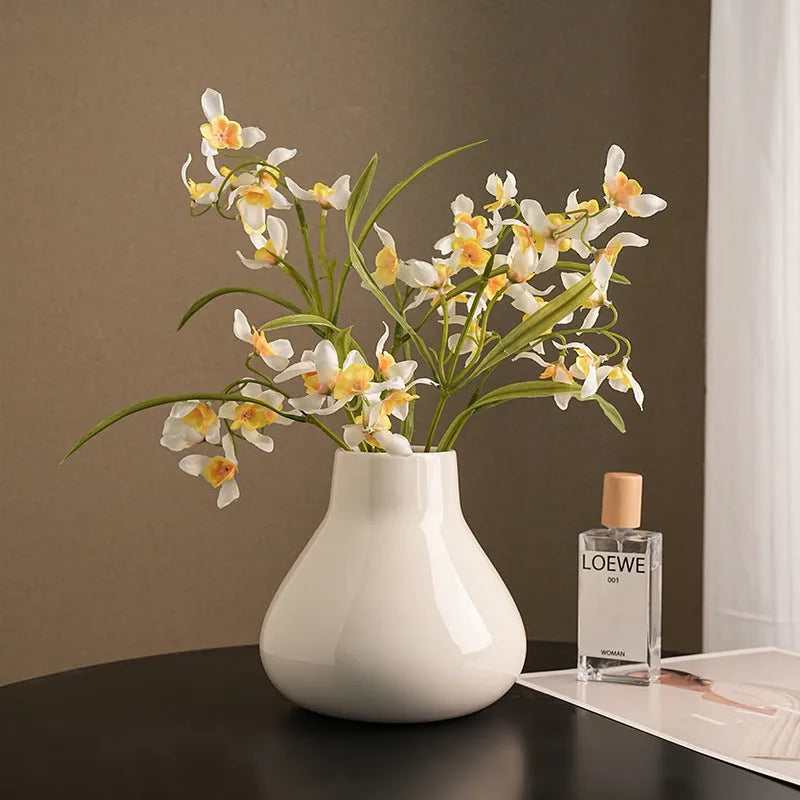 Modern black ceramic vase set with artificial white orchid flowers for home decoration