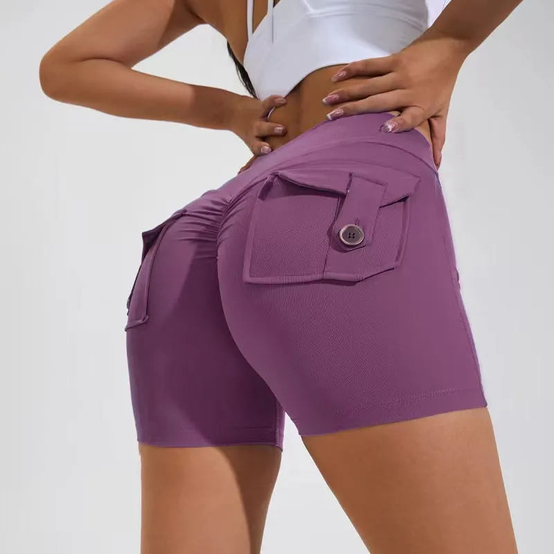 Women's high waist hip lifting sports shorts with side pockets in electric blue colour