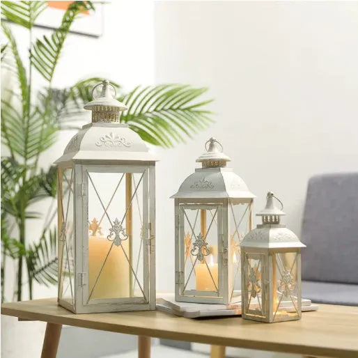 European black and white wrought iron floor-standing storm lantern with tempered glass in three sizes for courtyard decoration.