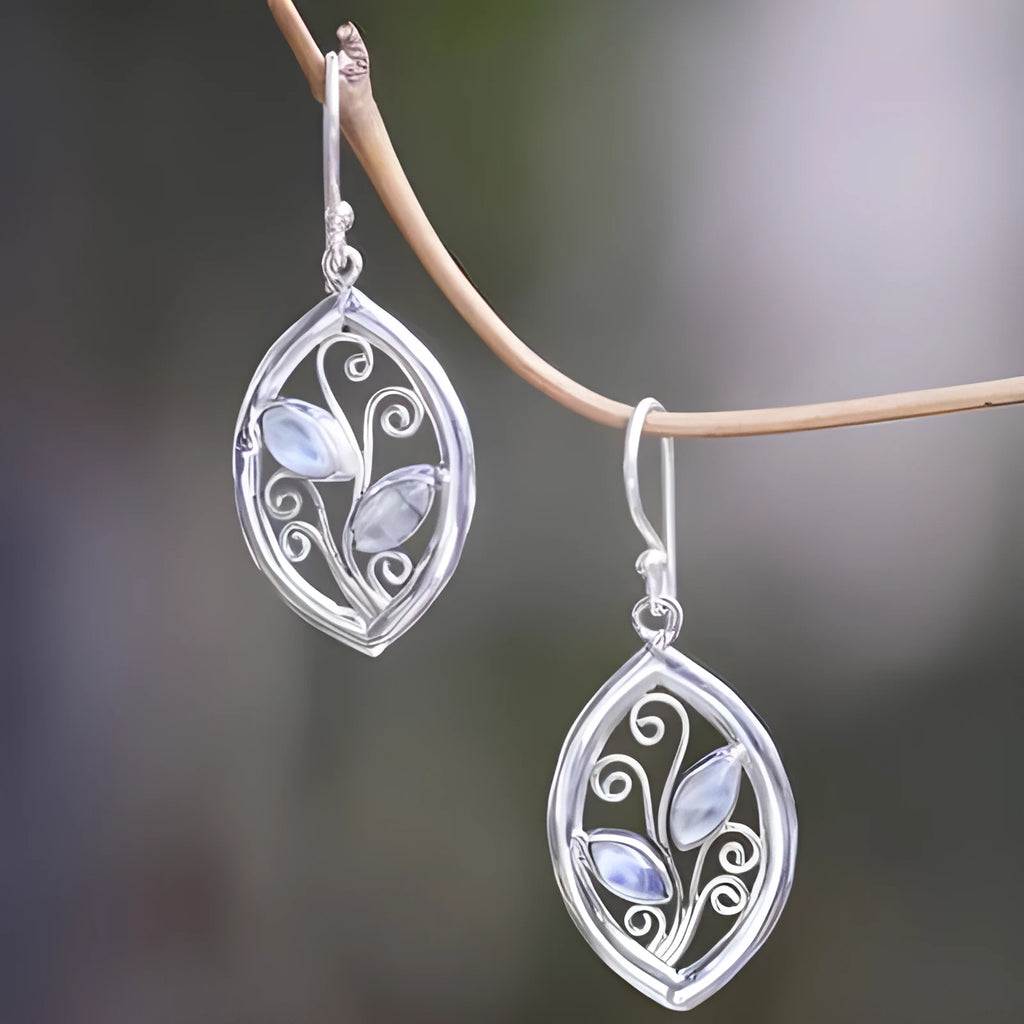 Silver colour leaf-shaped women's earrings with embedded colourful moonstones