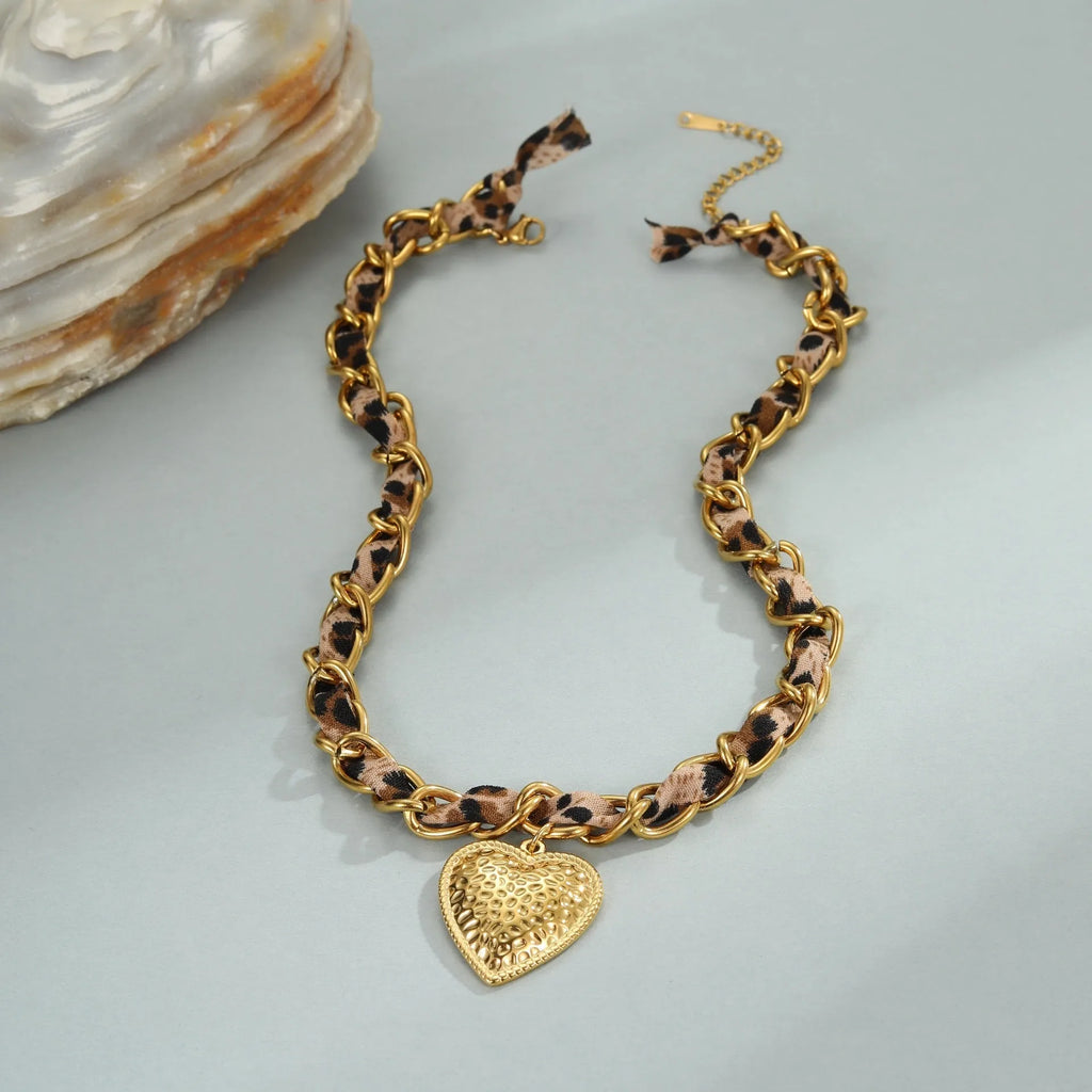 Stainless steel leopard love pendant necklace with adjustable chain and 18K gold electroplating