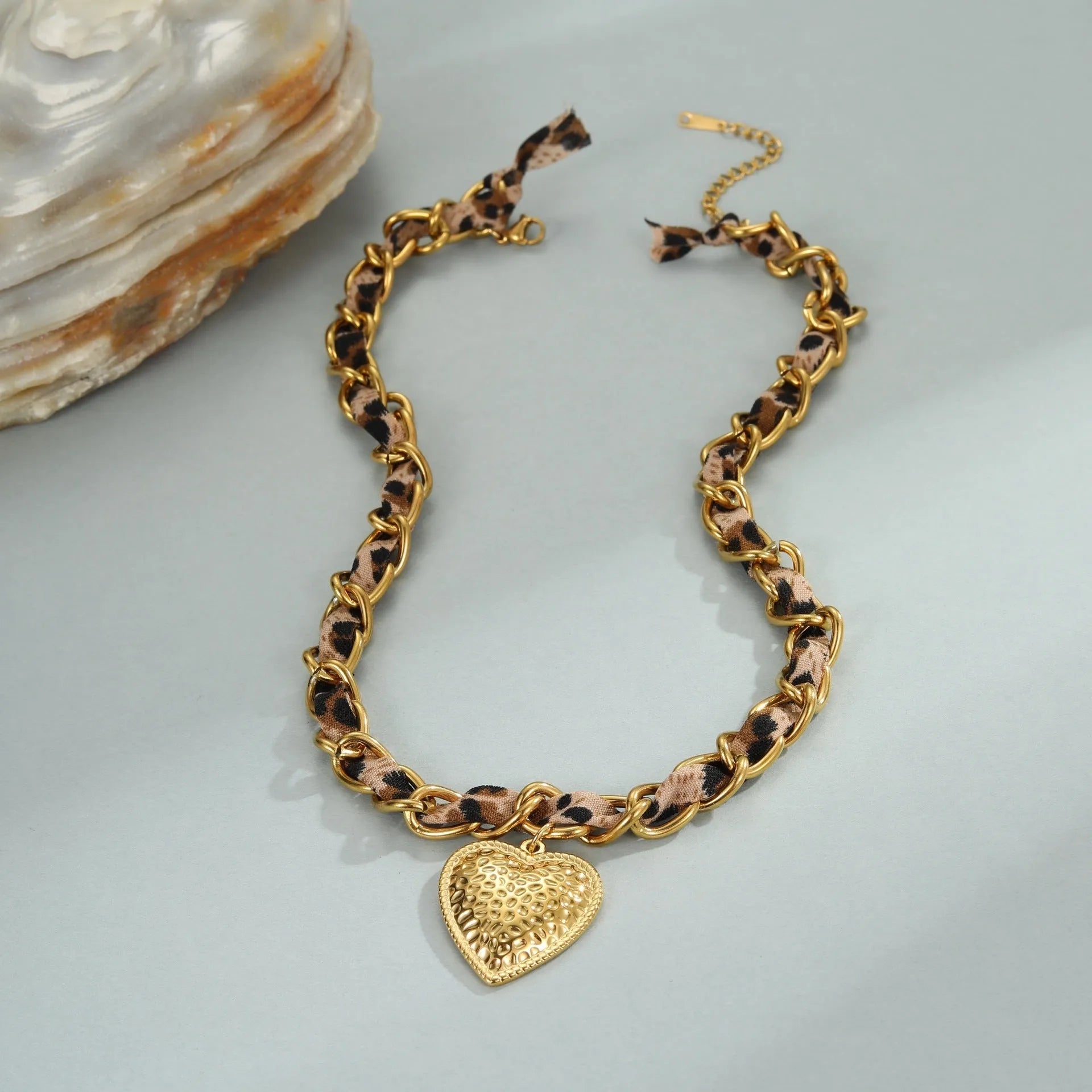 Stainless steel leopard love pendant necklace with adjustable chain and 18K gold electroplating