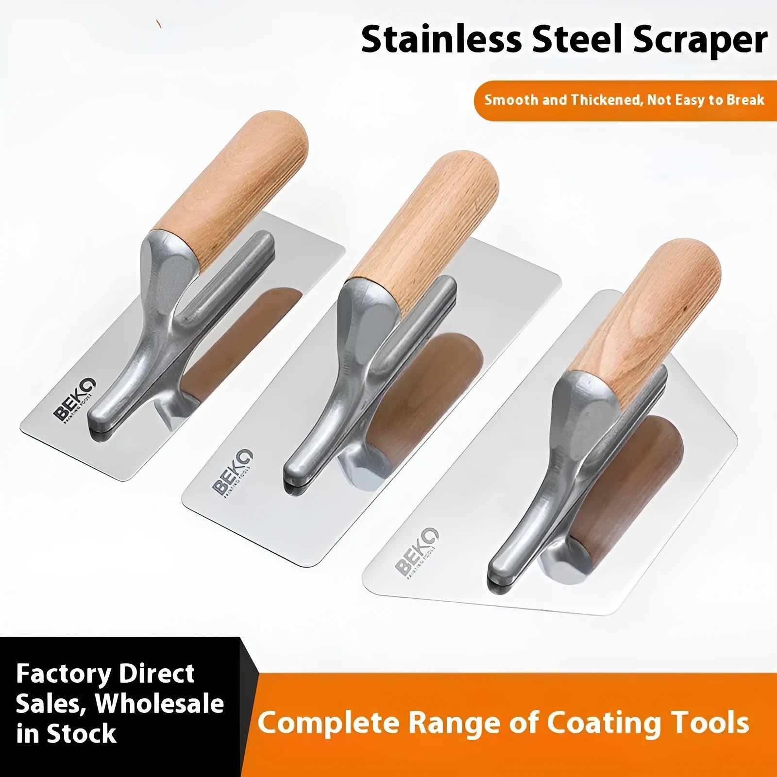 Three stainless steel putty scraper tools with wooden handles in different sizes on a workbench.