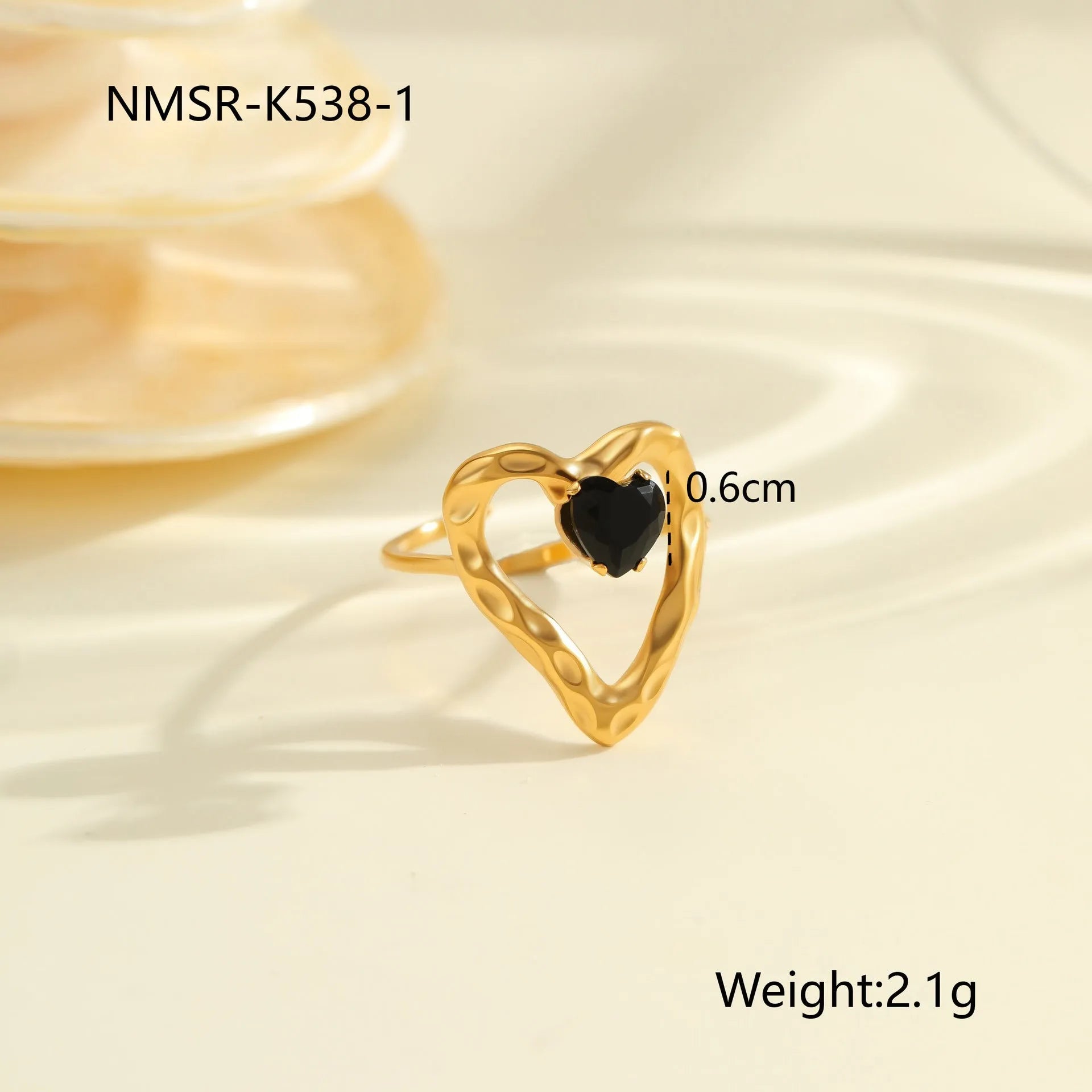 Geometric stainless steel ring for women with zircon detail and open adjustable design.