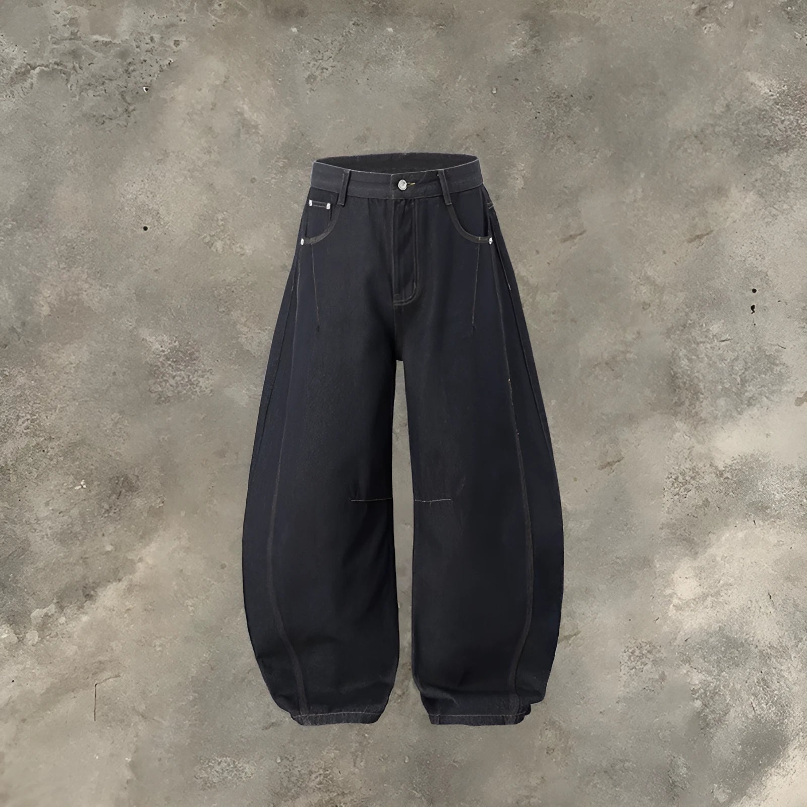 Men's original cow coloured wide leg denim trousers with a mid waist, laid flat.