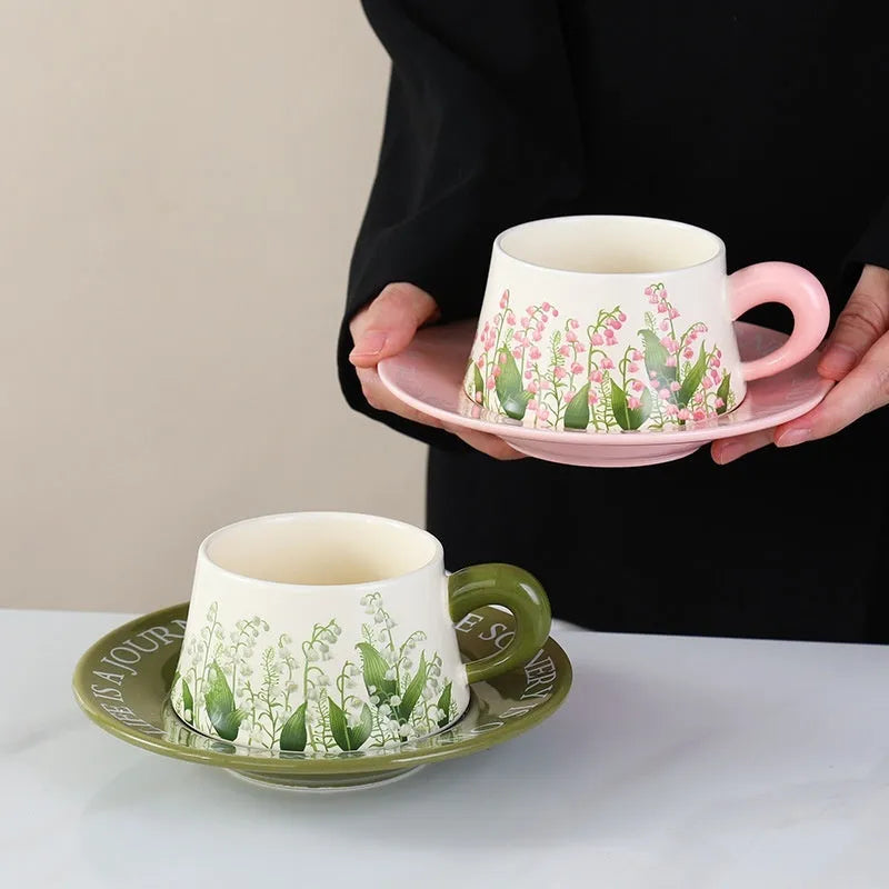 Ceramic coffee cup and saucer set with two 300ml cups, two saucers, and two spoons