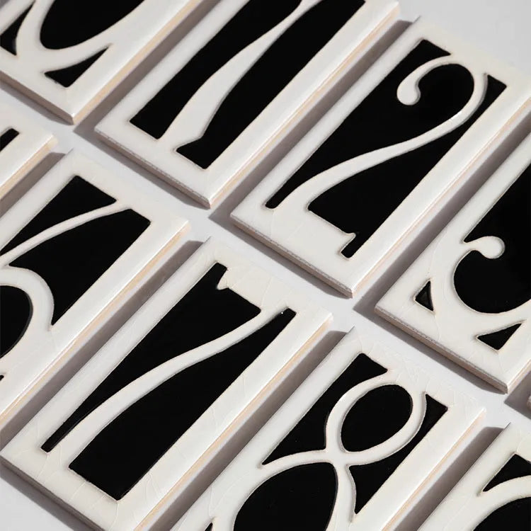 Handmade ceramic retro door number plate with blue enamel art, showing the number 5.
