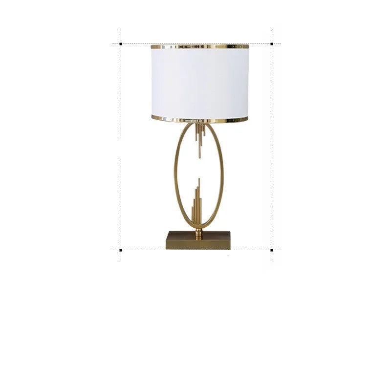 White Nordic style bedside lamp with drum shape and Phnom Penh trumpet design on a wooden table