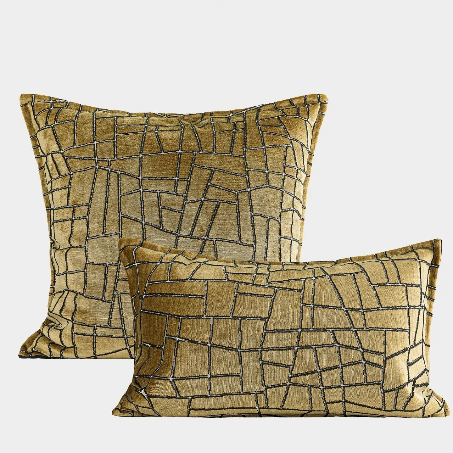 Gold geometric pattern decorative cushion cover shown in square and waist pillow sizes on a grey sofa.