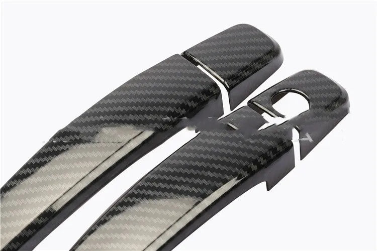 Carbon fibre pattern door handle overlay for Opel Vauxhall Astra car interior