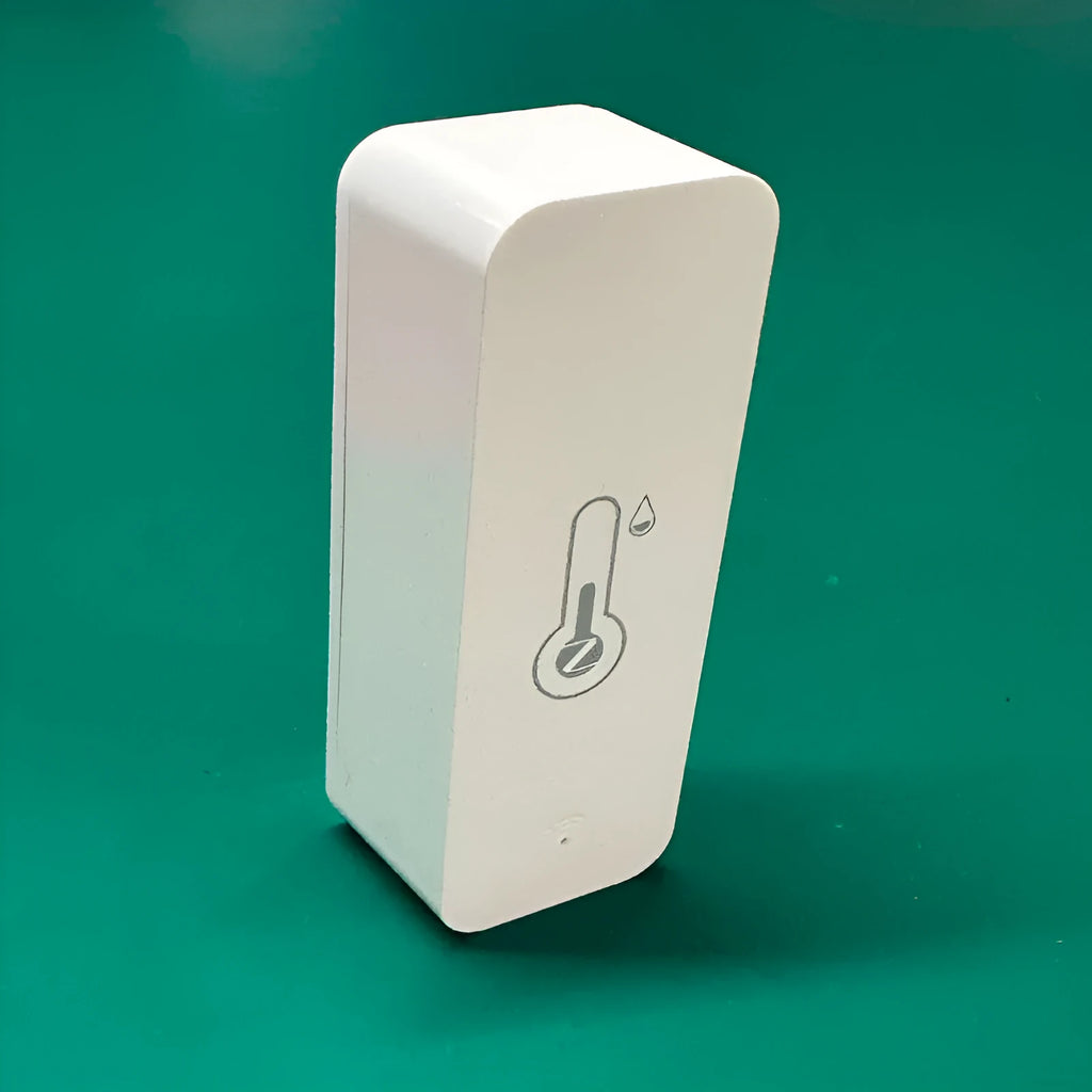 White WiFi temperature and humidity sensor with compact rectangular ABS housing