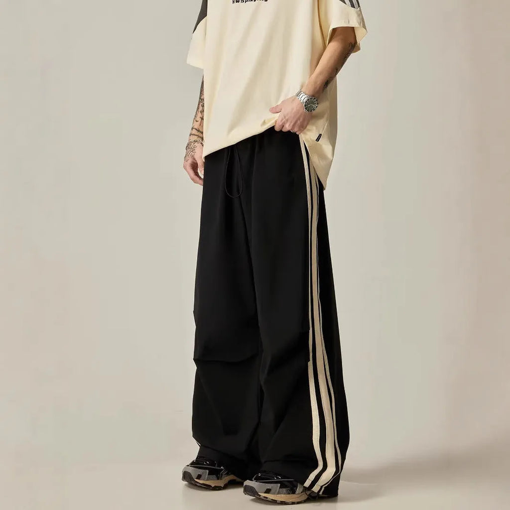 Men's black wide-leg climbing trousers with high waist and straight-leg design for summer outdoor activities