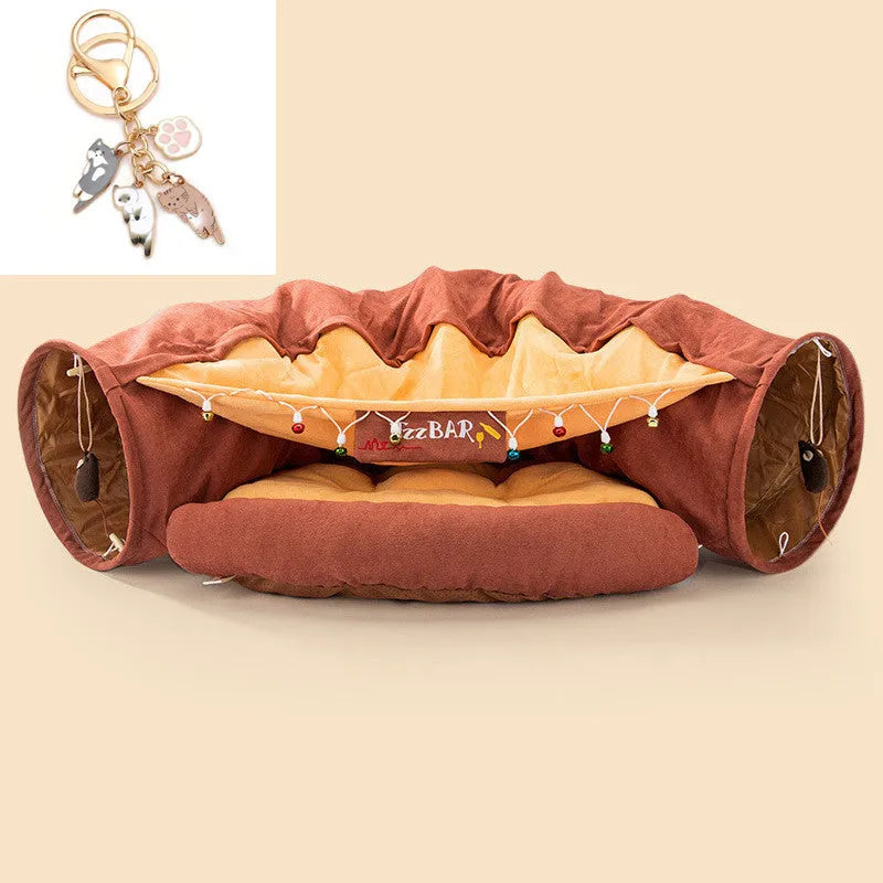 Collapsible cloth cat tunnel toy in pink, shown folded flat and opened for play