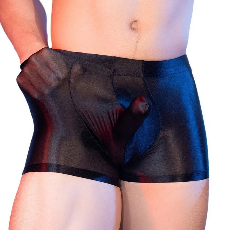 Men's red nylon boxer shorts with mid waist and seamless design on a white background.
