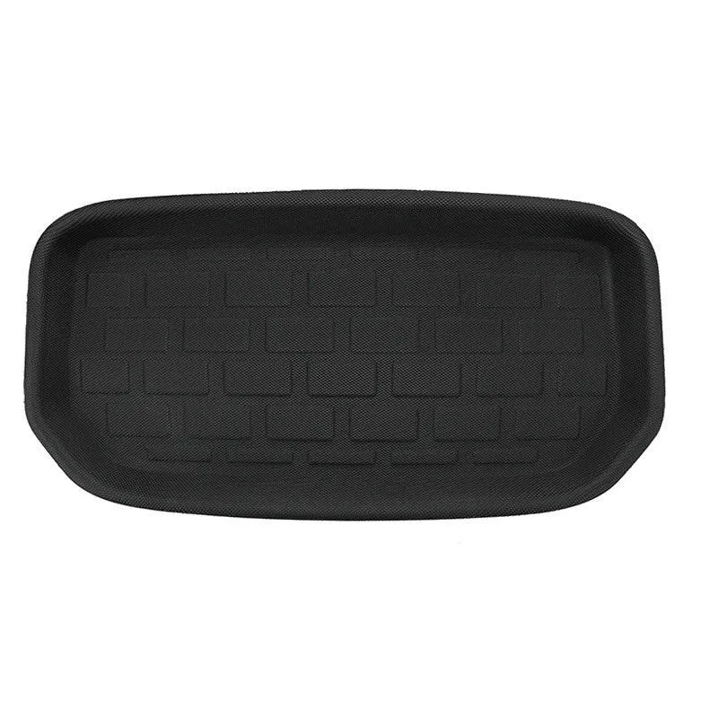 TPR floor mat set for Tesla Model Y showing footwell, storage box, and tailbox mats.
