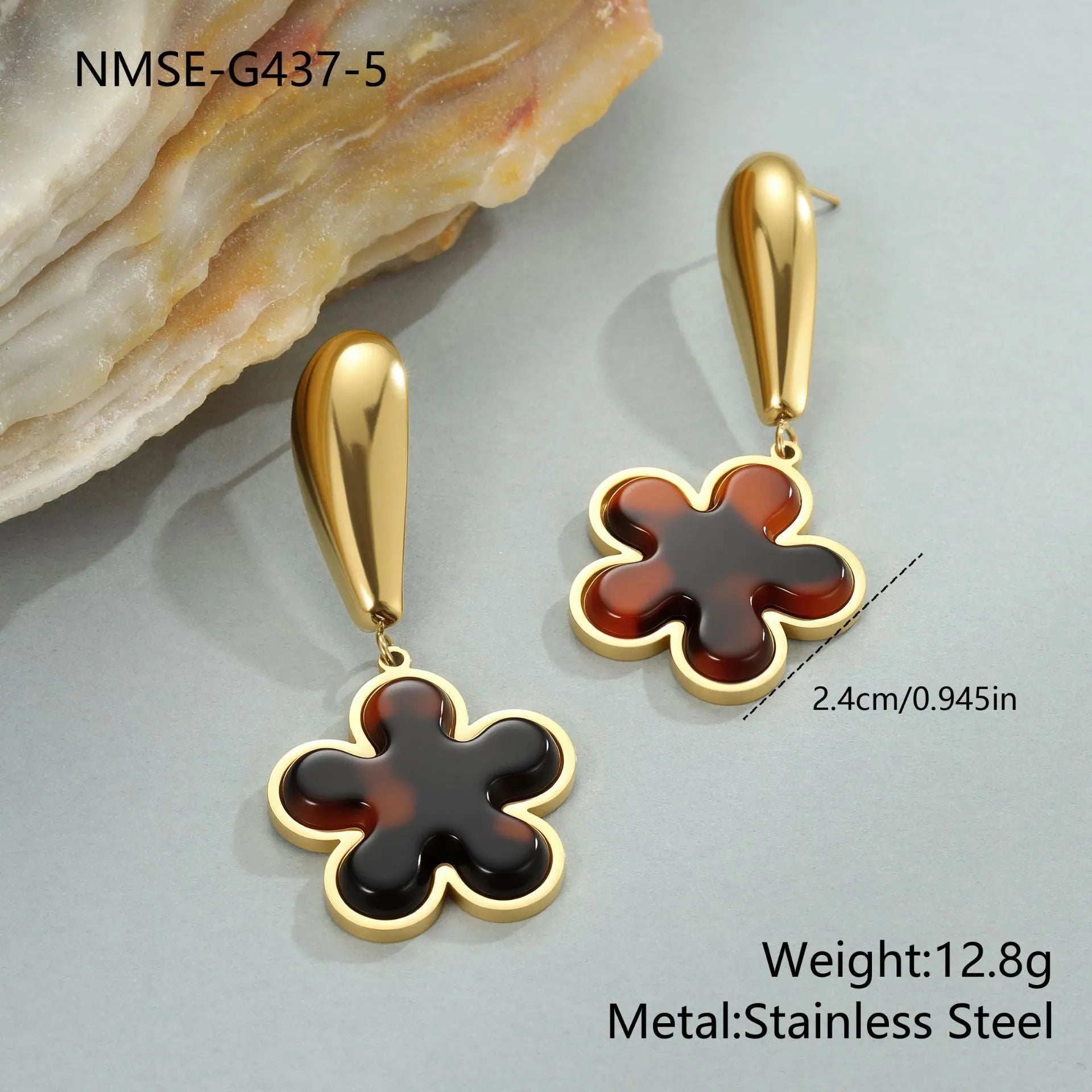 Gold electroplated tortoiseshell resin earrings in heart and geometric floral designs for women.