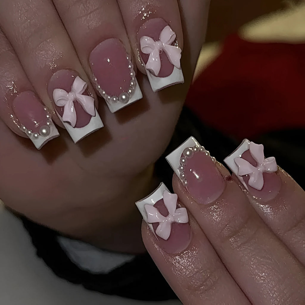 French manicure nail art set showing short white design with tulip, bow, starry sky, leopard print, and XINGX patterns