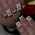 French manicure nail art set showing short white design with tulip, bow, starry sky, leopard print, and XINGX patterns