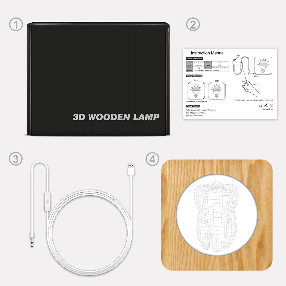 Wood-coloured tooth-shaped acrylic night lamp on a table with USB cable