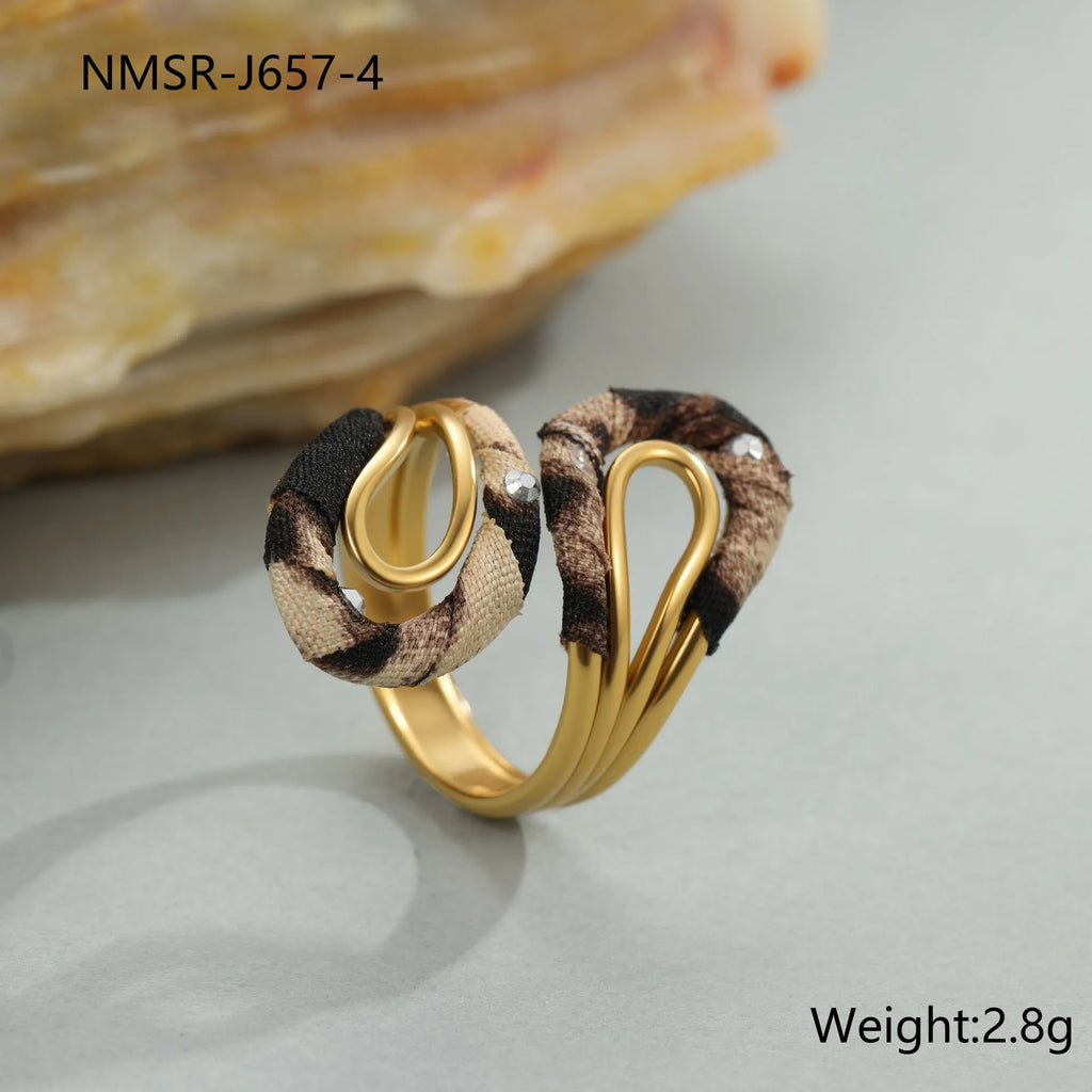 Leopard print stainless steel open mouth ring in heart, star, or geometric shape.