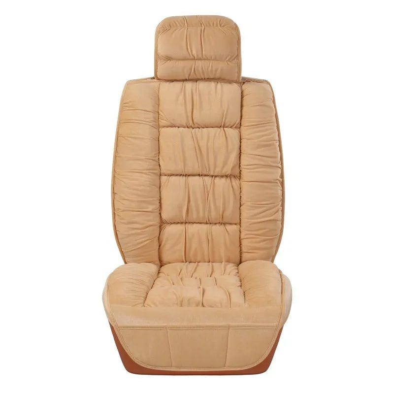 Short plush winter car seat cushion in grey, shown on a car seat.