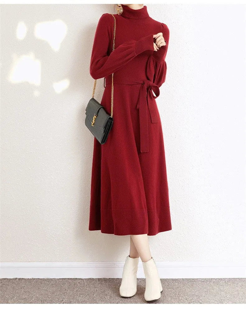Women's turtleneck long sleeve knit dress in loose fit with big hem and elastic waist.