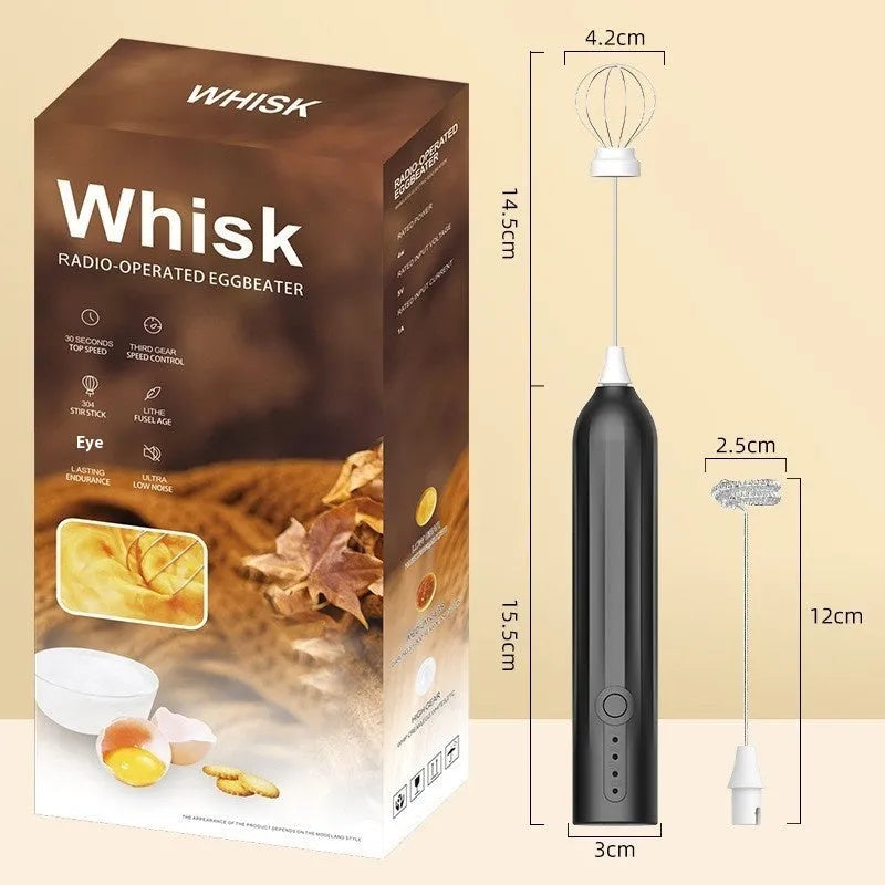 Black handheld electric milk frother with stainless steel whisk and USB charging port