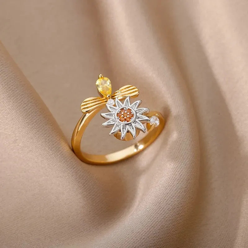 Simple geometric copper decompression ring with rotating mechanism in gold or platinum finish