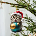 Cartoon-style kitten Christmas ornament for car interior, made from clear acrylic glass.