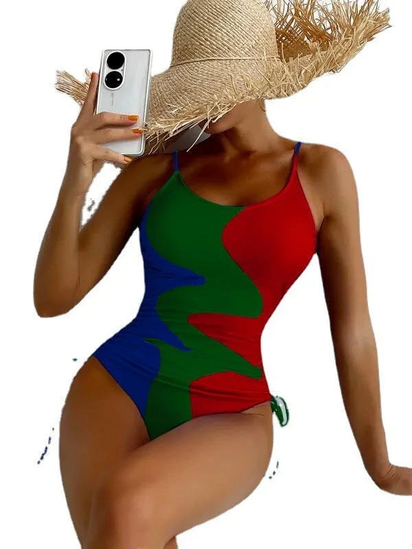 Women's sleeveless backless one-piece swimsuit in blue, shown in a solid colour style.