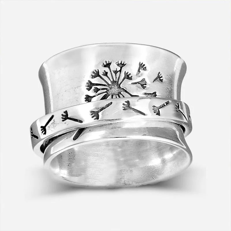Silver rotatable flower ring with adjustable floral decoration on alloy band