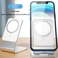 Silver aluminium alloy wireless charging stand holding a phone upright on a desk