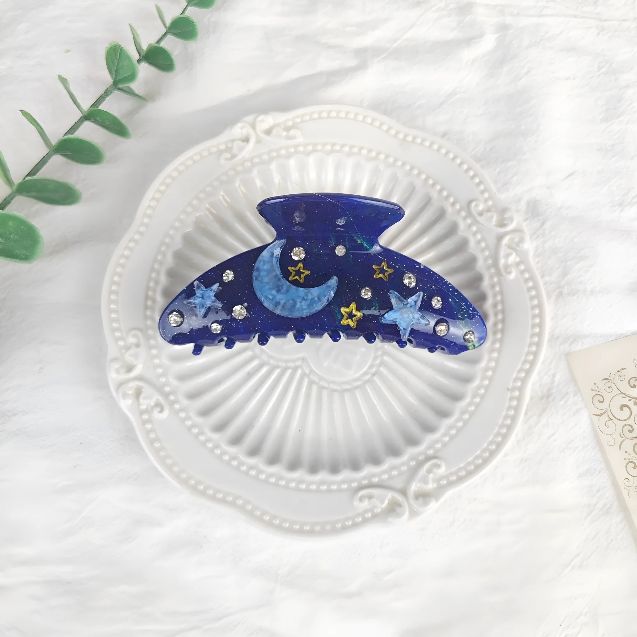 Oversized star moon barrette in celestial colours with irregular minimalist design