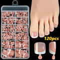 120-piece box of French white tip false toenails in nude colours, square short shape.