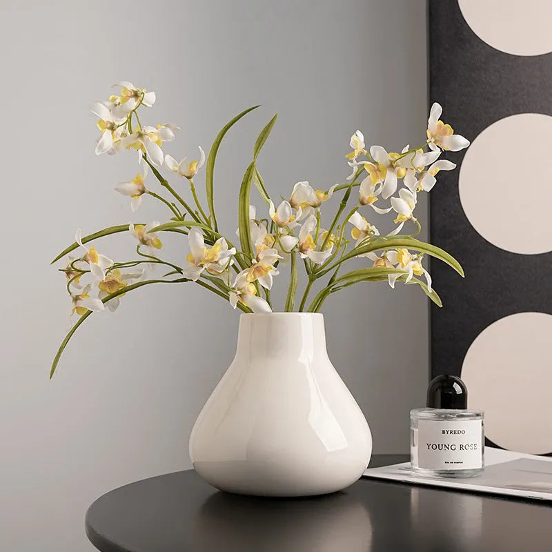 Modern black ceramic vase set with artificial white orchid flowers for home decoration