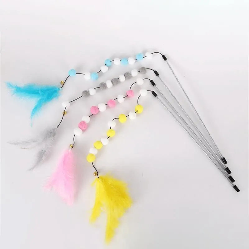 Set of four colourful cat teaser toy rods with feathers, pompons and bells.