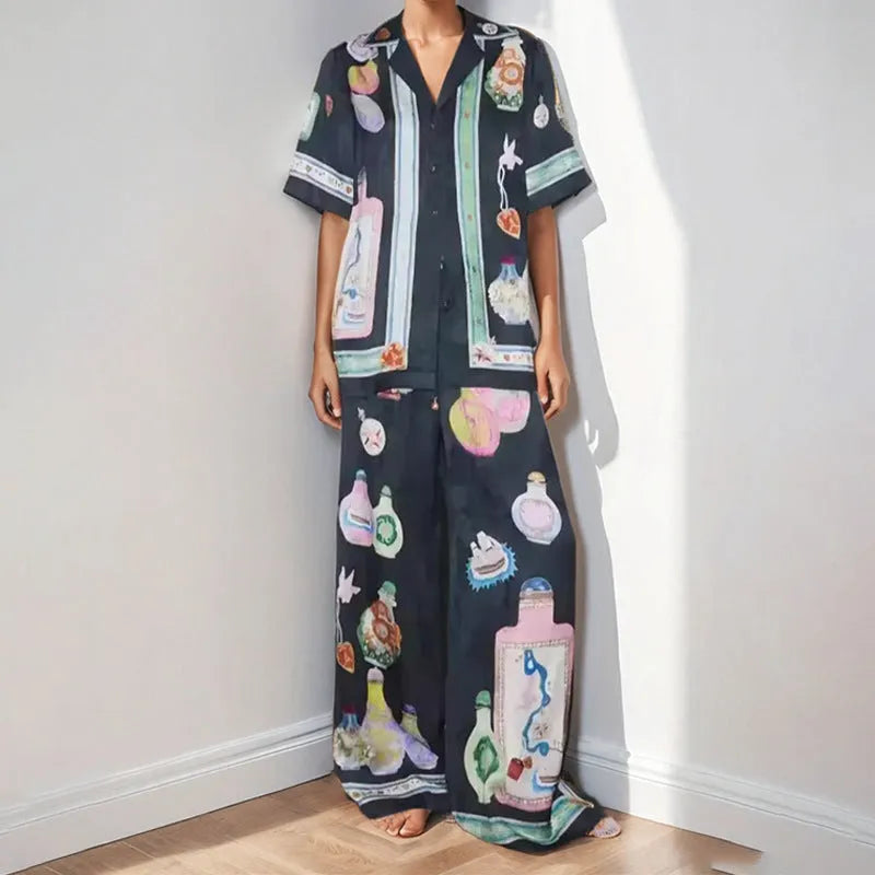 Black women's cartoon print casual set with cardigan and matching trousers