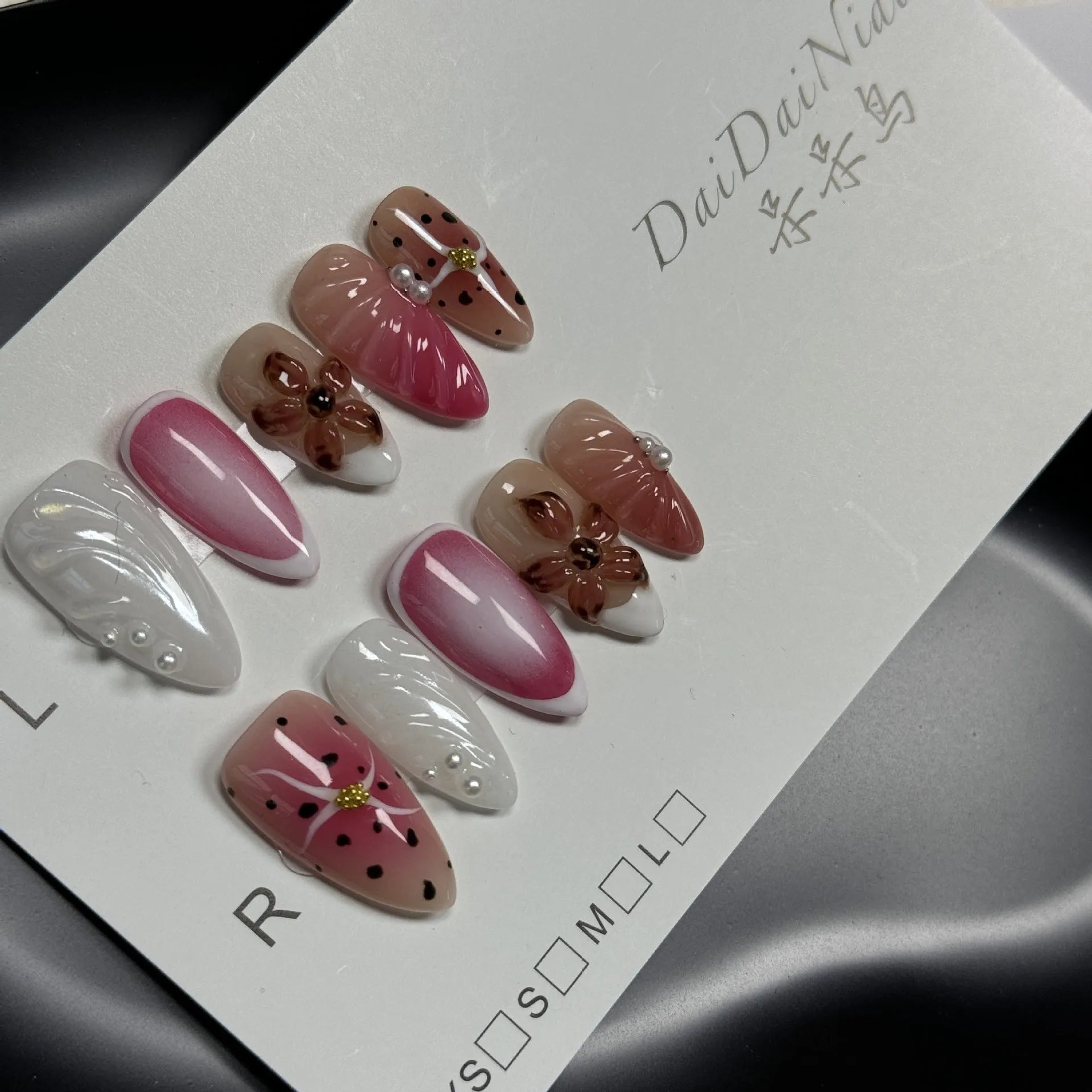Hand-painted 3D carved nail beauty patches with embossed candy pattern in four sizes.