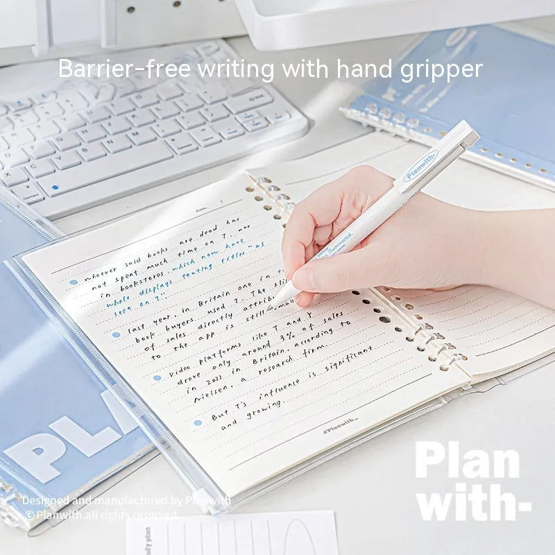 Clear PVC A5 notebook cover showing spiral binding slot and document pockets in white and blue colour options