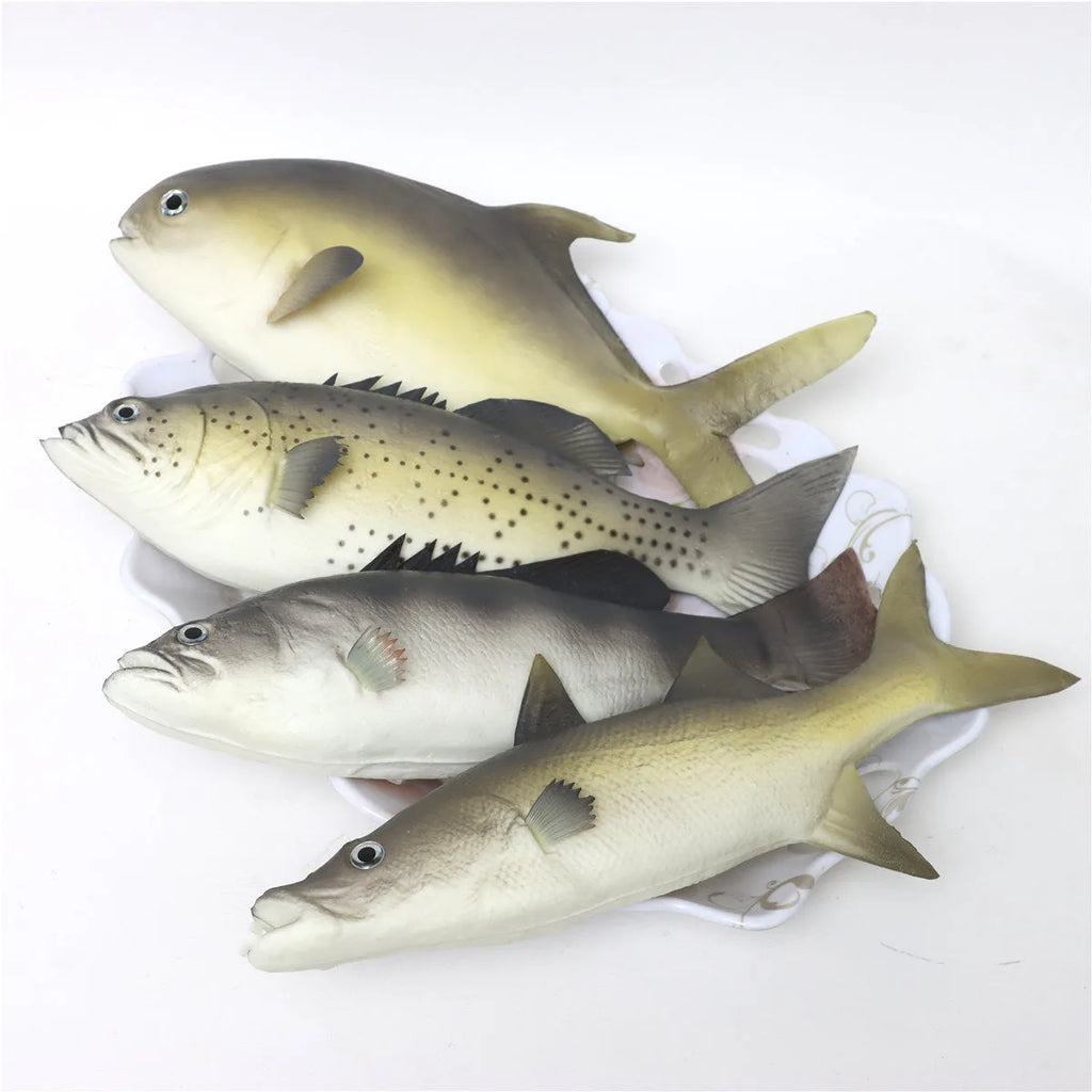 Three PU simulated fish ornaments showing yellow-fin tuna, yellow croaker, and flower fish designs for marine decoration