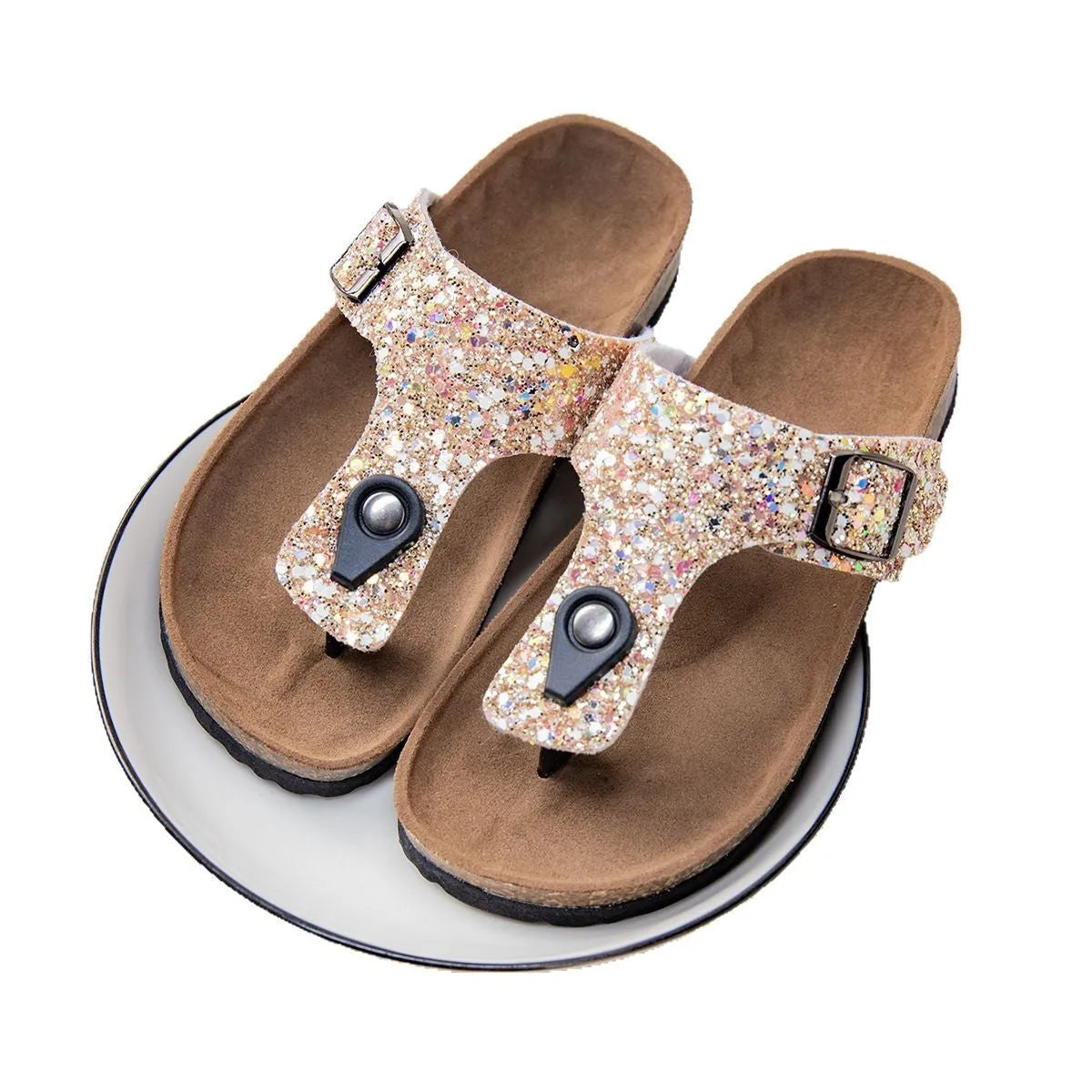 Gold, pink, and silver cork couples flip-flops with artificial leather upper and non-slip sole.