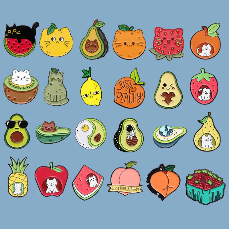 Colourful cartoon fruit design on a silver-toned zinc alloy metal brooch with pin clasp.